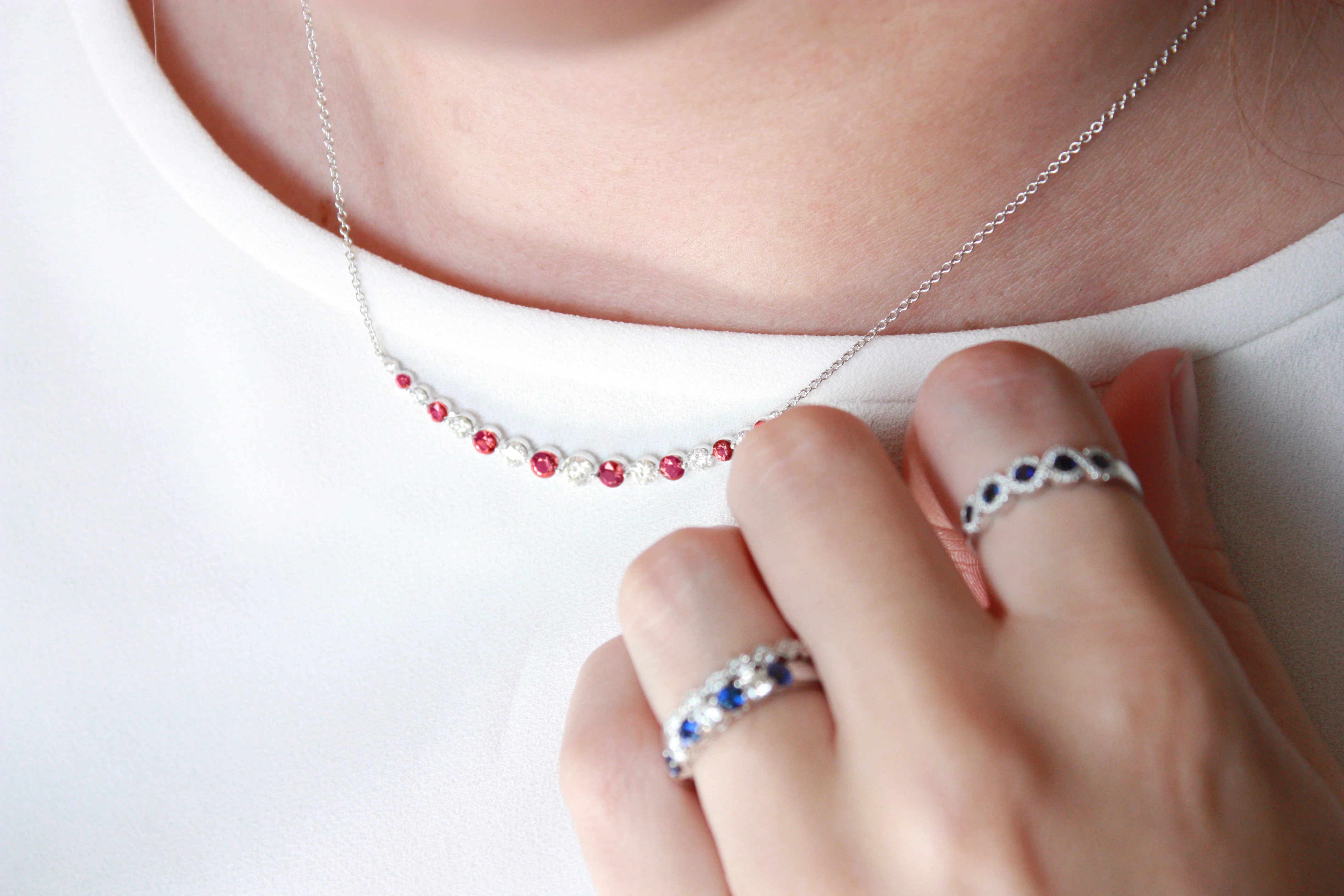 Sabel Collection 18K White Gold Round Diamond and Round Ruby Curved Bar Necklace - Image 2